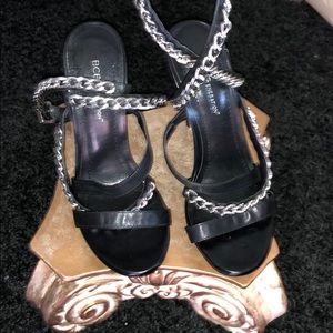 BCBG black ankle strap sandal with chain accent.